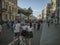 MOSCOW, RUSSIA - MAY 9, 2016: A skinhead with two girls are walking along street after the march Immortal Regiment