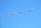 MOSCOW, RUSSIA - May 9, 2018: Group of Russian military tactical front-line bombers SU-24 in flight in the blue sky