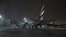 MOSCOW, RUSSIA, NOVEMBER 11, 2016: Airline Emirates A380. Airbus is parked at the Domodedovo airport. Passengers waiting