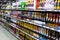 Moscow, Russia - November 17, 2019: Shelves with bottles of sparkling wine champagne. French red and white wine in a supermarket