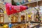 Moscow, Russia - November 21, 2019: Red spaceship with christmas tree and gifts on the board above alley of GUM State Department