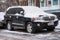 MOSCOW, RUSSIA,NOVEMBER,28.2018:Abandoned snow covered car Toyota Land Cruiser on a big city street