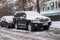 MOSCOW, RUSSIA,NOVEMBER,28.2018:Abandoned snow covered car Toyota Land Cruiser on a big city street