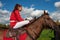 Moscow, Russia October 1, 2016: Cossack gathering. Cossack equestrian girls demonstrate traditional flanking techniques