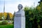 Moscow, Russia - October 12, 2020: Bust of Russian natural scientist Mikhail Vasilievich Lomonosov next to Moscow State University