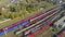 MOSCOW, RUSSIA - OCTOBER 2, 2020. Aerial tracking shot of the red double decker Aeroexpress train, an airport shuttle