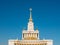 Moscow, Russia - October 5, 2021: The main pavilion of VDNKh. A monumental building with a spire 97 meters high. Close-up