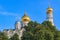 Moscow, Russia - September 02, 2018: Domes of Cathedral of the Archangel and Ivan the Great Bell-Tower on Moscow Kremlin territory