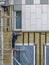 Moscow. Russia. September 06, 2020 A construction worker in uniform and a protective helmet stands on the scaffolding