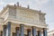 Moscow, Russia - September 13, 2019: Granite columns and roof above main entrance to the Russian state library. Architecture of