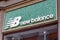 Moscow, Russia - September 13, 2019: New Balance sign on the storefront. Signboard of american sportswear manufacturer New Balance