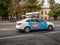 Moscow, Russia - September 14, 2019: Car with ice cream BTL advertisement sundae rides around city. Dummy of huge pack of ice