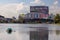 Moscow, Russia, September 2019: Ostankino television center on the background of a pond on a cloudy autumn day. Ducks in the pond