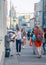 Moscow, Russia - September 6, 2018: Elderly woman asks for alms from passersby on the street. Retiree standing bent over