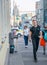 Moscow, Russia - September 6, 2018: Elderly woman asks for alms from passersby on the street. Retiree standing bent over