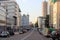 A Moscow street in summer with many buildings and parked cars