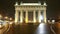 Moscow Triumphal gate at night Street with trams.