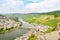 Moselle Valley Germany: View from Landshut Castle to the old town Bernkastel-Kues with vineyards and river Mosel in summer