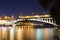 Moskva River, Andreyevsky Bridge in the light of night colored lights. Moscow, Russia