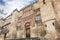 The Mosque Cathedral in Cordoba, Spain. Exterior wall with great golden door - famous landmark in Andalusia