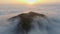 Mosque on clouds over at the mountain peak