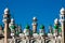 Mosque green domes and minaret towers