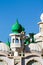 Mosque green domes and minaret towers