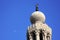 Mosque with jet contrail in egypt