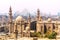 The Mosque-Madrassa of Sultan Hassan and the Pyramids in the background, Cairo, Egypt