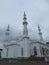 mosque or masjid At Thohir. Located in podomoro golf view cimanggis, depok, west java, Indonesia. Beautiful white mosque.