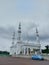 mosque or masjid At Thohir. Located in podomoro golf view cimanggis, depok, west java, Indonesia. Beautiful white mosque.
