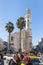 A mosque with a minaret stands in the main square  - Manger Square - in Bethlehem in Palestine