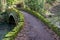 A mossy bridge over the Ouseburn river in Jesmond Dene, Newcastle upon Tyne, UK.