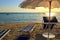 The most beautiful sandy beaches of Apulia.Salento coast: umbrellas at sunset.Porto Cesareo beach.ITALY (Lecce).