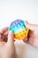 The most fashionable sensory toy. New popular colorful anti-stress toy pop it in the shape of a hexagon in hand. Fidget toy