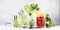 Most popular alcoholic cocktails set: mojito, gin tonic and negroni on gray background with bar tools. Banner