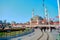 Most well known taksim square during morning with details of taksim, recently constructed taksim mosque and many turkish flags, .