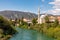 Mostar, Bosnia and Herzegovina - april 2017: Nerteva River and Old City of Mostar, with Ottoman Mosque