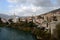 Mostar city with mosque minaret medieval architecture Neretva river Bosnia Herzegovina