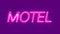 Motel neon sign appear on violet background.