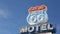 Motel retro sign on historic route 66 famous travel destination, vintage symbol of road trip in USA. Iconic lodging