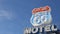 Motel retro sign on historic route 66 famous travel destination, vintage symbol of road trip in USA. Iconic lodging signboard in