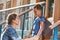 Mother accompanies the child to school. mom encourages student accompanying him to school. a caring mother looks tenderly at her