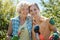 Mother and adult daughter enjoying garden work together