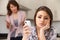 Mother Arguing With Daughter Over Use Of mobile Phone