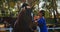 Mother assisting daughter during horse riding 4k