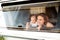 Mother and baby son in a camper van.