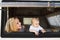 Mother and baby son in a camper van.