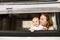 Mother and baby son in a camper van.