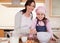 Mother baking with her daughter